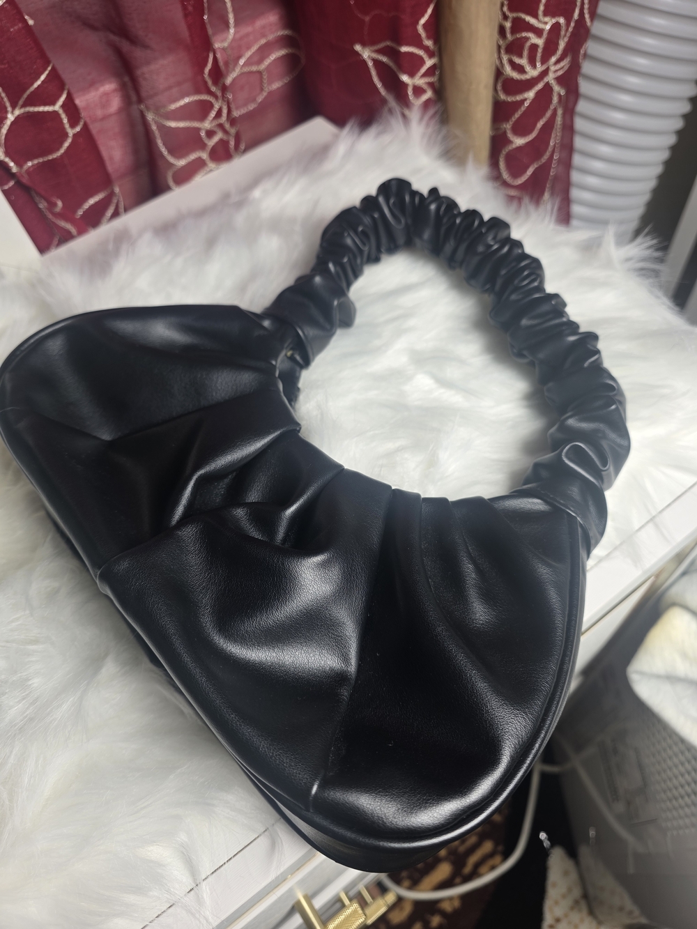 Sleek Black Ruched Shoulder Bag with Gathered Strap